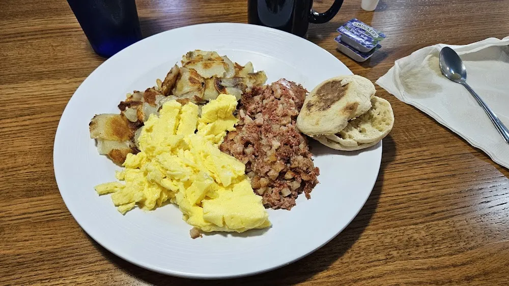 Hash Scrambled Eggs Potatoes and Muffin